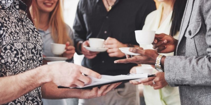 close up of people at a networking event